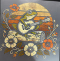 Frog playing guitar
