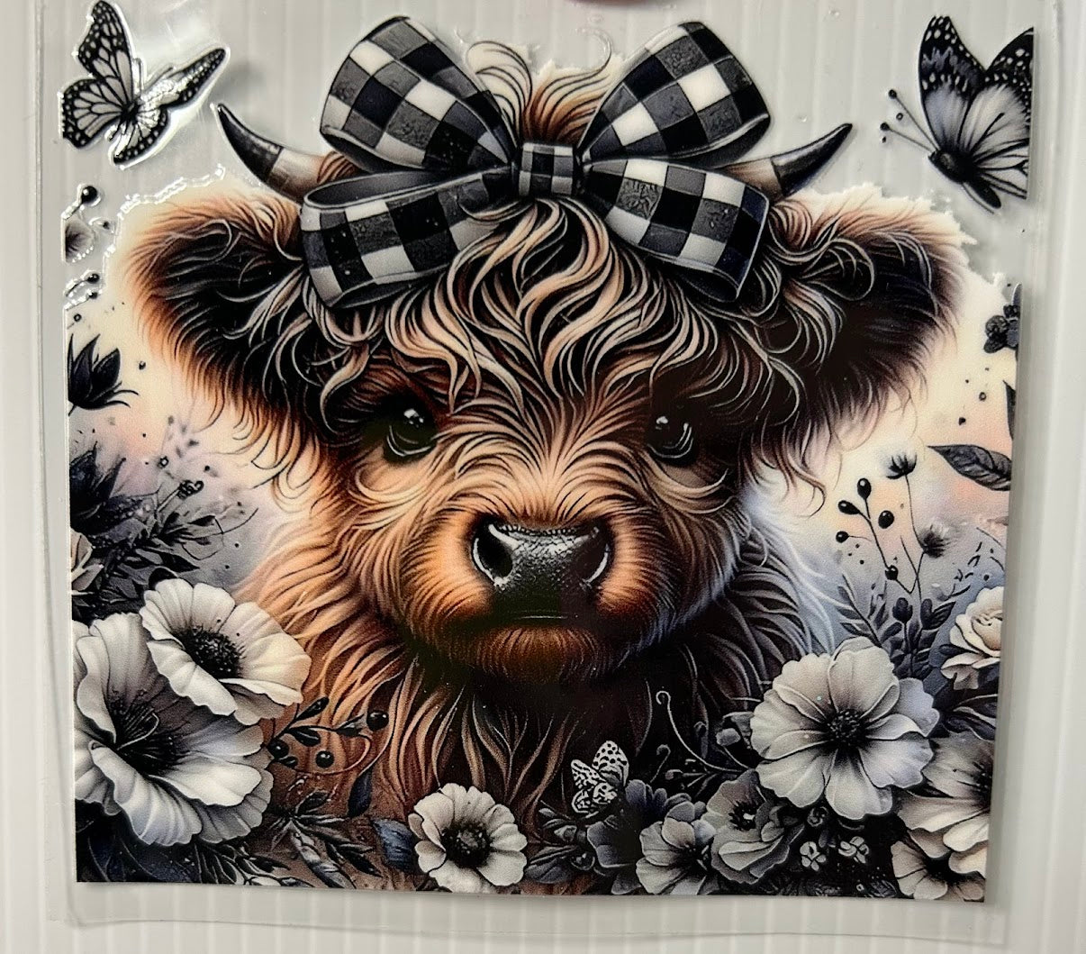 Cow with black & white bow